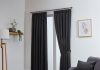 Why is curtain fabric to be selected with care?