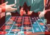 Why do duplicate accounts get flagged at an online casino?